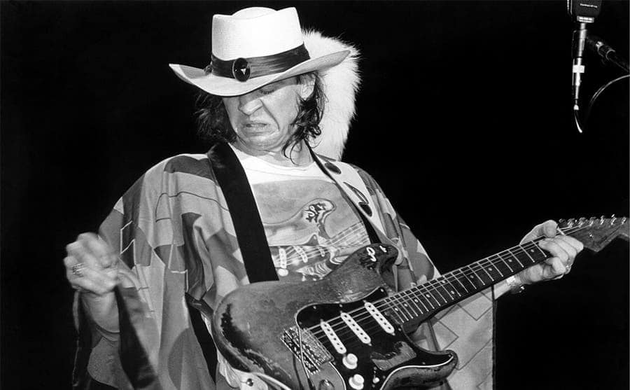 stevie ray vaughan playing guitar